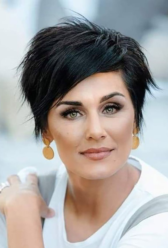 Pixie cut, Short hairstyles, Spring/summer trends, Low-maintenance, Versatility, Hair fashion, Hair color experimentation, Seasonal style, Timeless appeal, Bold statement, Facial feature enhancement, Spring fashion, Summer fashion, Haircut practicality, Haircut creativity, Chic look, Confidence, Edginess, Sophistication, Warm weather styling, Statement earrings, Trendy hats, Light, airy clothing, Floral prints, Bright colors, Big chop,