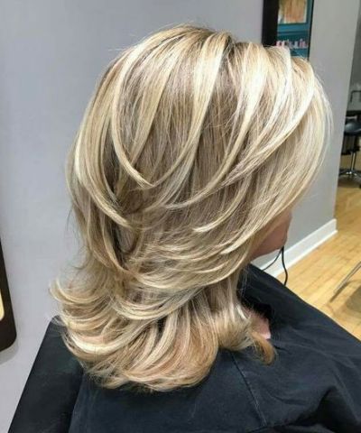 feathered haircuts for medium length hair