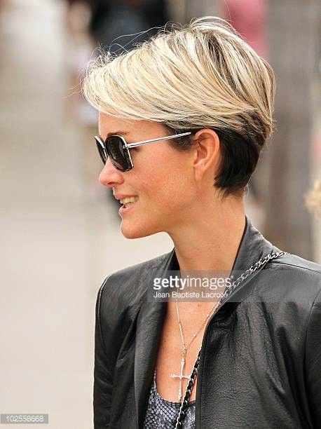 Pixie cut, Short hairstyles, Spring/summer trends, Low-maintenance, Versatility, Hair fashion, Hair color experimentation, Seasonal style, Timeless appeal, Bold statement, Facial feature enhancement, Spring fashion, Summer fashion, Haircut practicality, Haircut creativity, Chic look, Confidence, Edginess, Sophistication, Warm weather styling, Statement earrings, Trendy hats, Light, airy clothing, Floral prints, Bright colors, Big chop,