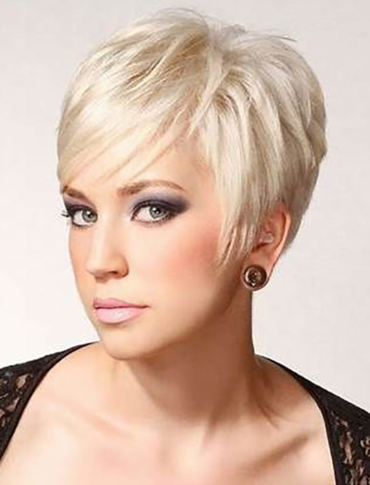 Pixie cut, Short hairstyles, Spring/summer trends, Low-maintenance, Versatility, Hair fashion, Hair color experimentation, Seasonal style, Timeless appeal, Bold statement, Facial feature enhancement, Spring fashion, Summer fashion, Haircut practicality, Haircut creativity, Chic look, Confidence, Edginess, Sophistication, Warm weather styling, Statement earrings, Trendy hats, Light, airy clothing, Floral prints, Bright colors, Big chop,