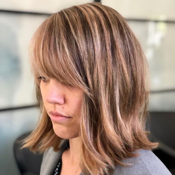 long bob with side swept bangs