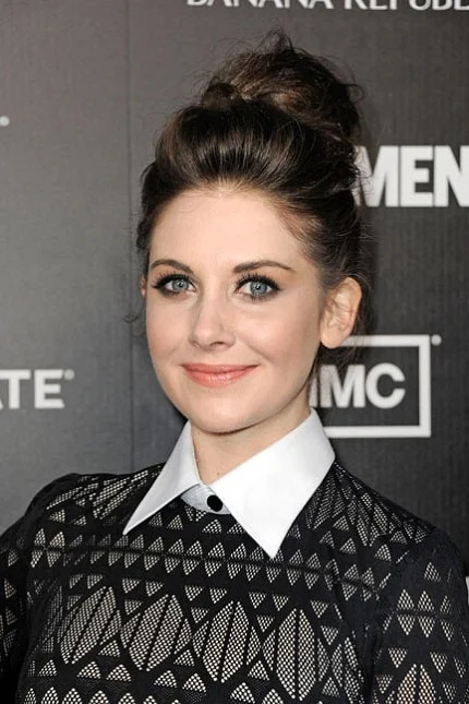 Effortless top-knot hairstyle for younger look