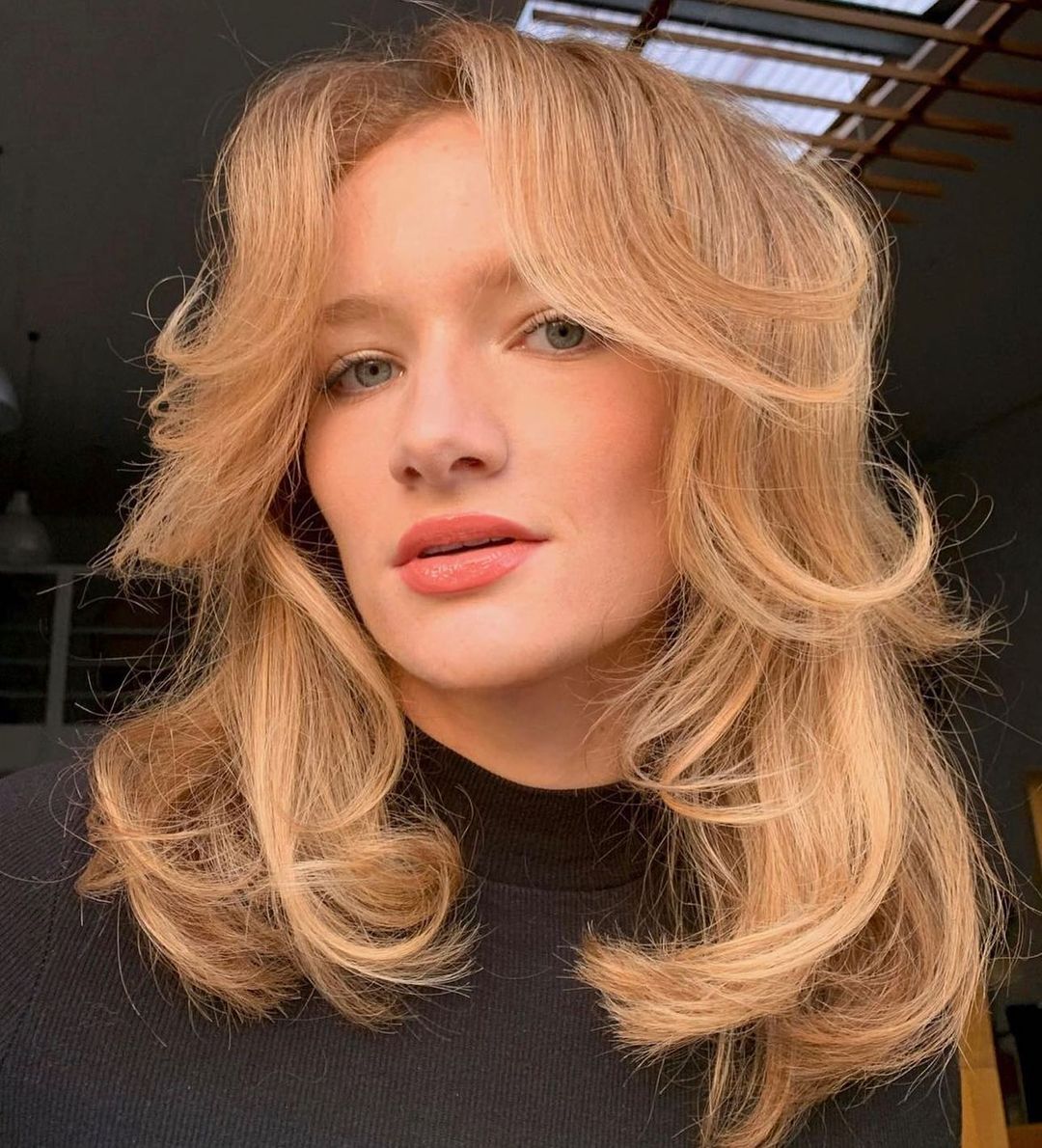 Medium Layered Haircuts with Bangs