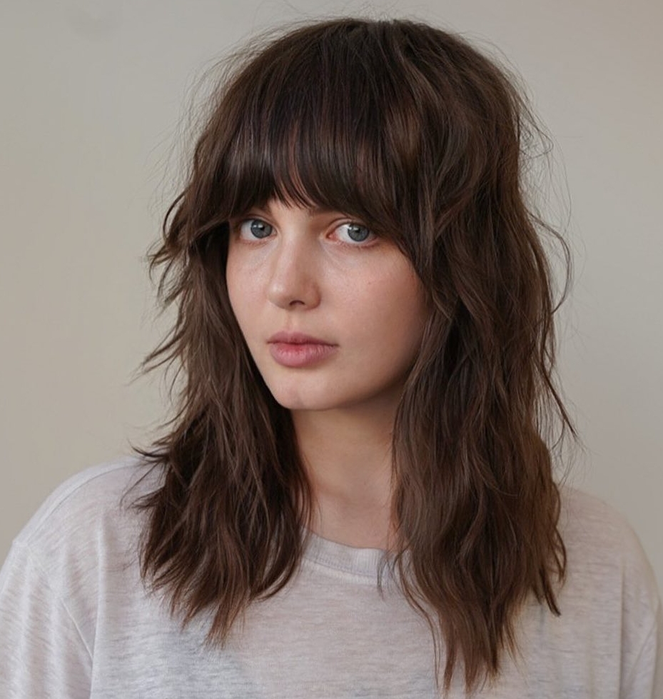 Medium Layered Haircuts with Bangs